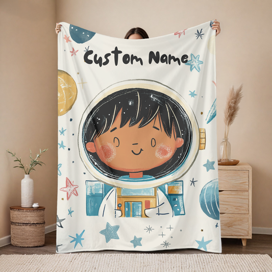 Personalized astronaut baby blanket with custom name, space explorer portrait design on light background with stars and planets, nursery decor mockup